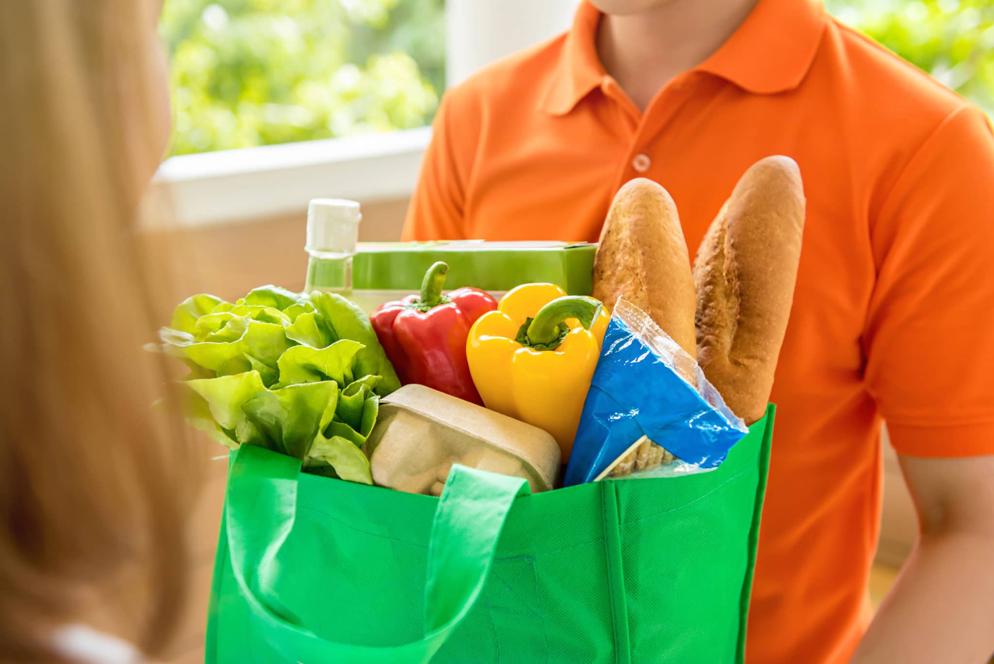 on demand food delivery worker delivering food