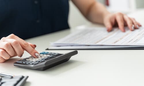 A tax expert filing back tax returns to submit to the IRS.