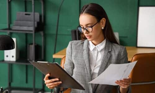 A female tax professional working to remove wage garnishments from clients.