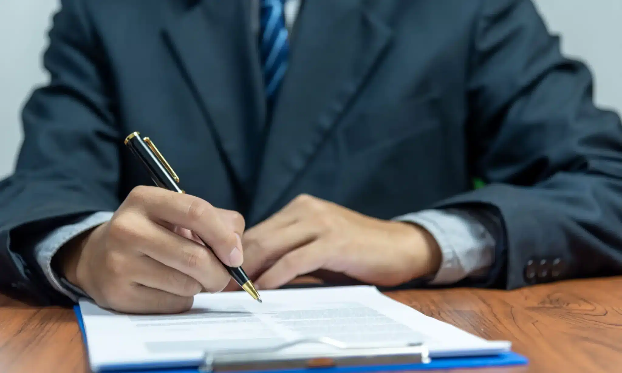 A Montana tax expert working on papers a client needs to file their taxes.