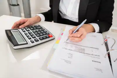 A tax professional going through a client's tax records in order to get a lien removal.