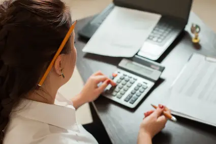 A tax expert doing a client's taxes and working on an offer in compromise.