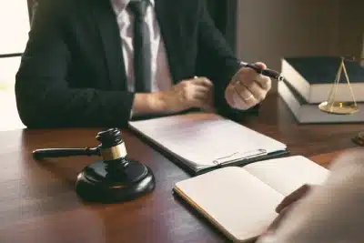 A Bozeman tax lawyer discusses how to handle an IRS revenue officer with a client who is sitting in front of them.